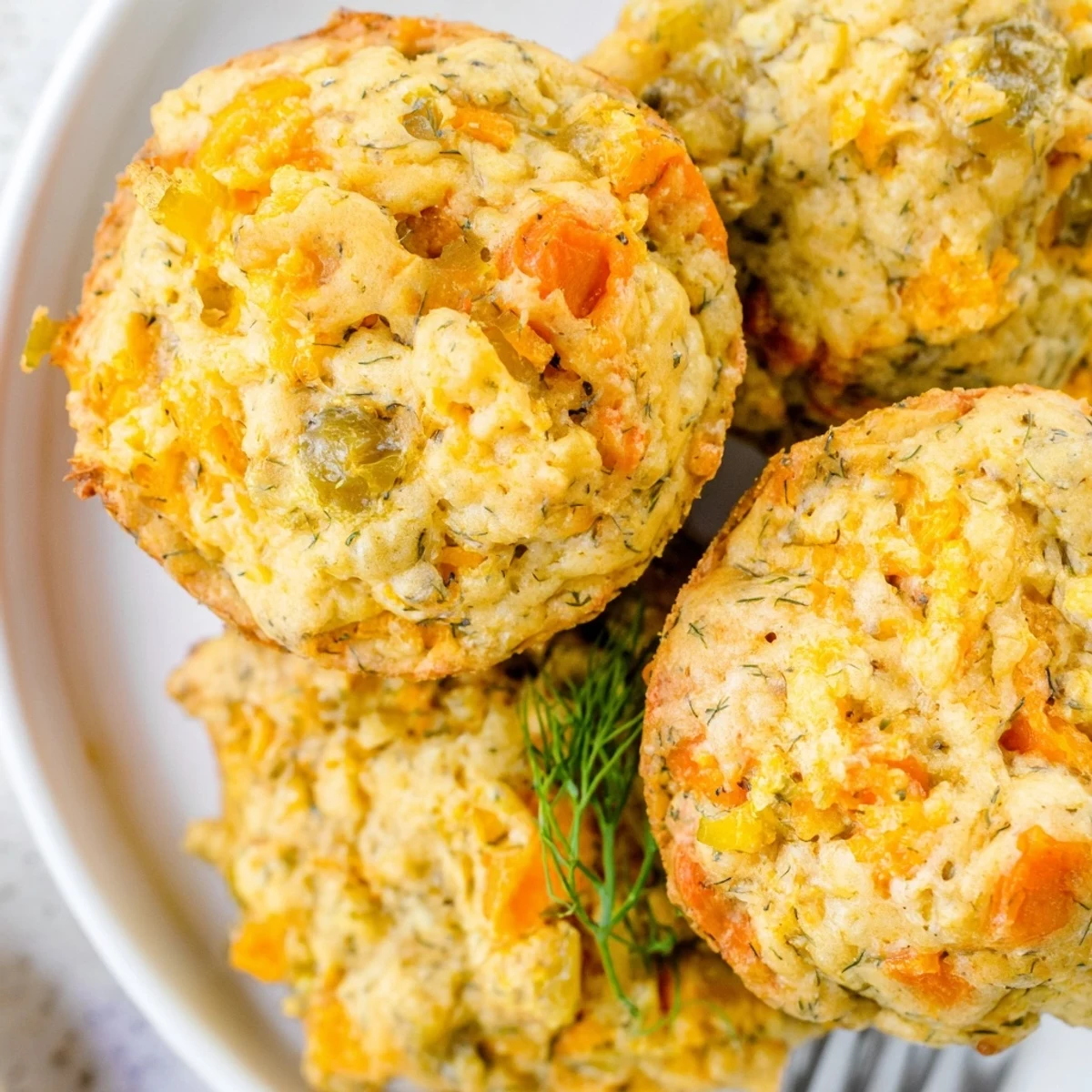 Savory Dill Pickle Sweet Potato Drop Muffins, warm and inviting, perfect for snacking or sides.  