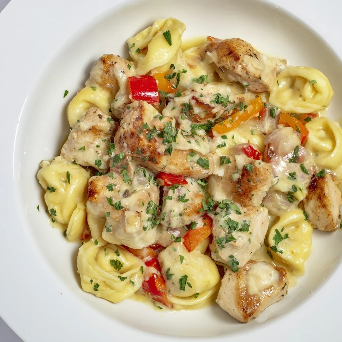 This Zesty Cajun Garlic Parmesan Chicken Tortellini combines creamy sauce, tender chicken, and cheesy tortellini beautifully.