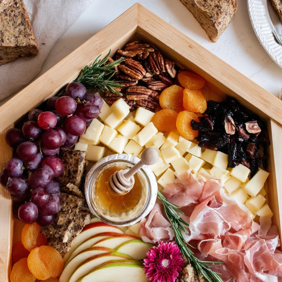 Sweet Home Charcuterie Board brimming with cheeses, fruits, and meats for a delicious appetizer spread.