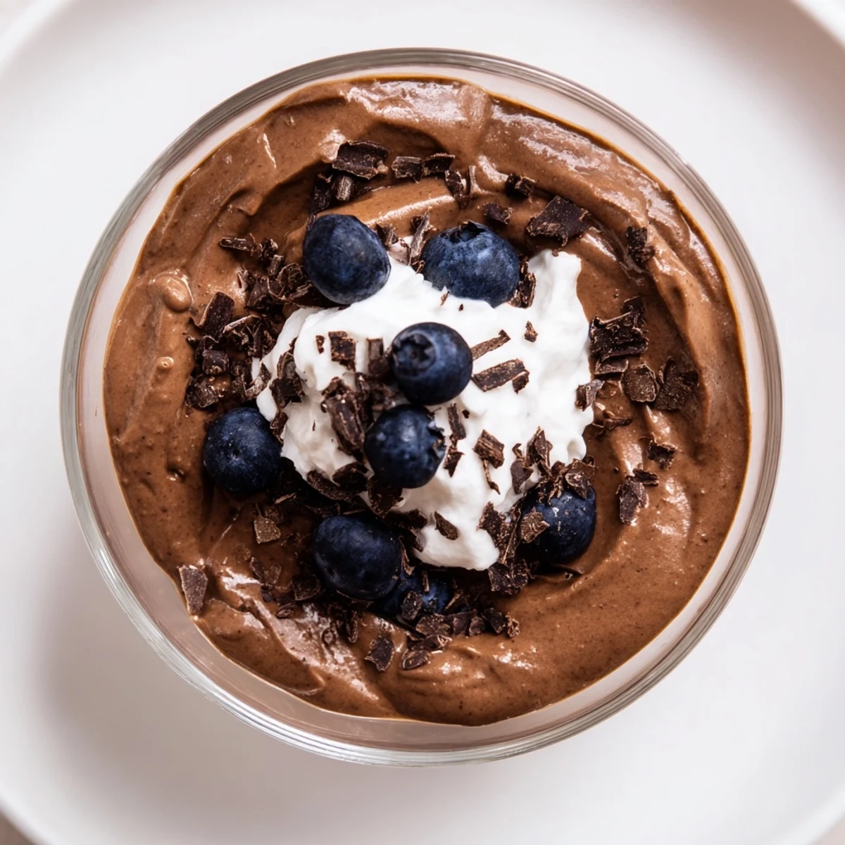 A close-up of creamy avocado chocolate pudding, offering a satisfying, healthy treat ready to eat.