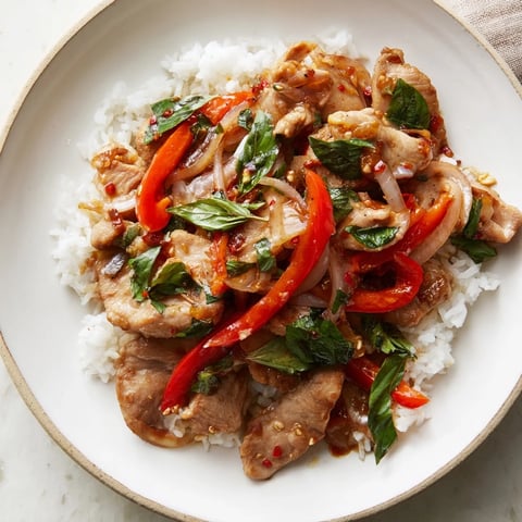 A flavorful Thai Basil Chicken Bowl with perfectly cooked chicken and fragrant basil.