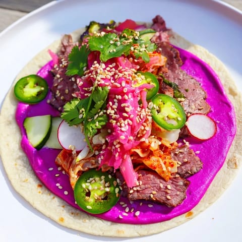 Savory beef sirloin Global Street-Food Fusion Tacos & Bowls ready for a festive meal.  