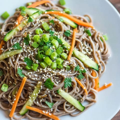 These refreshing Chilled Noodle Lunch Cups showcase perfectly chilled noodles, vibrant veggies, and a savory sauce.
