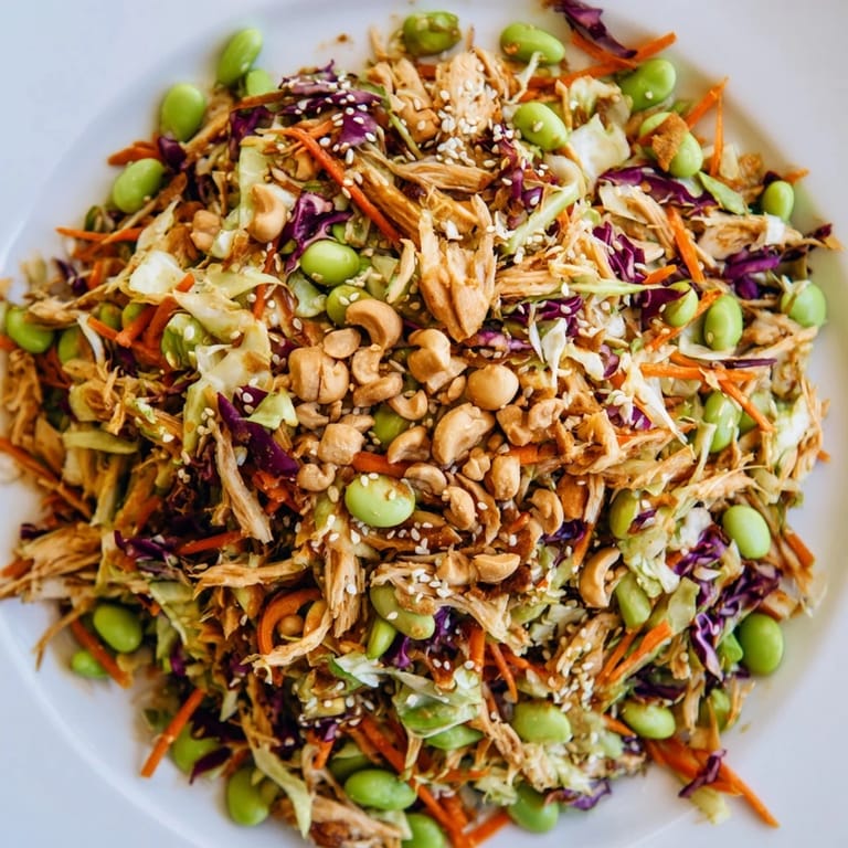 Edamame Crunch Chicken Salad served fresh with tender shredded chicken, colorful veggies, and toasted sesame seeds for extra crunch.